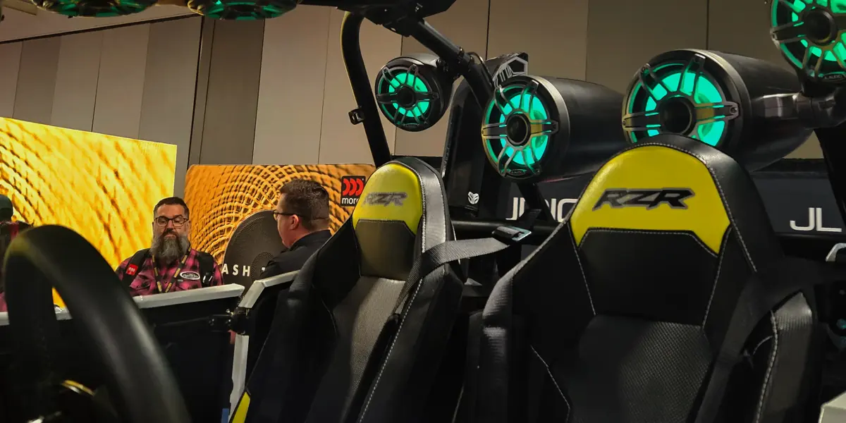 Polaris RZR side-by-side fitted with LED-lit tower speakers and roof speakers